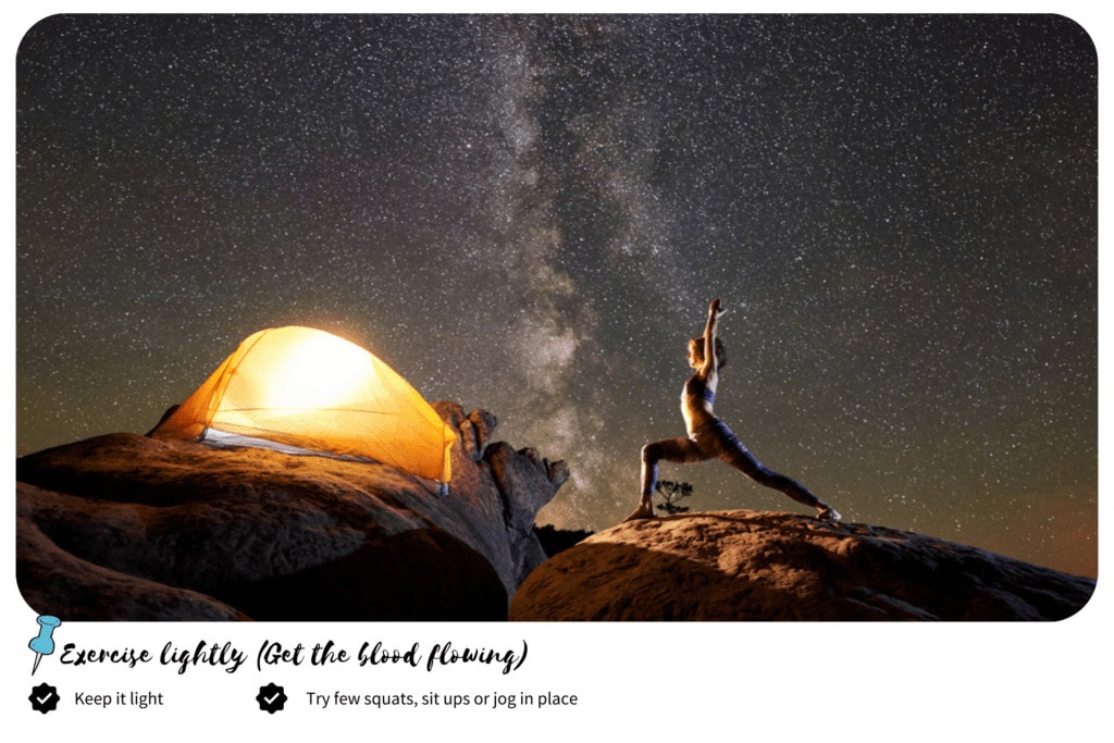 Woman stretching above a big rock beside a tent on a starry night sky