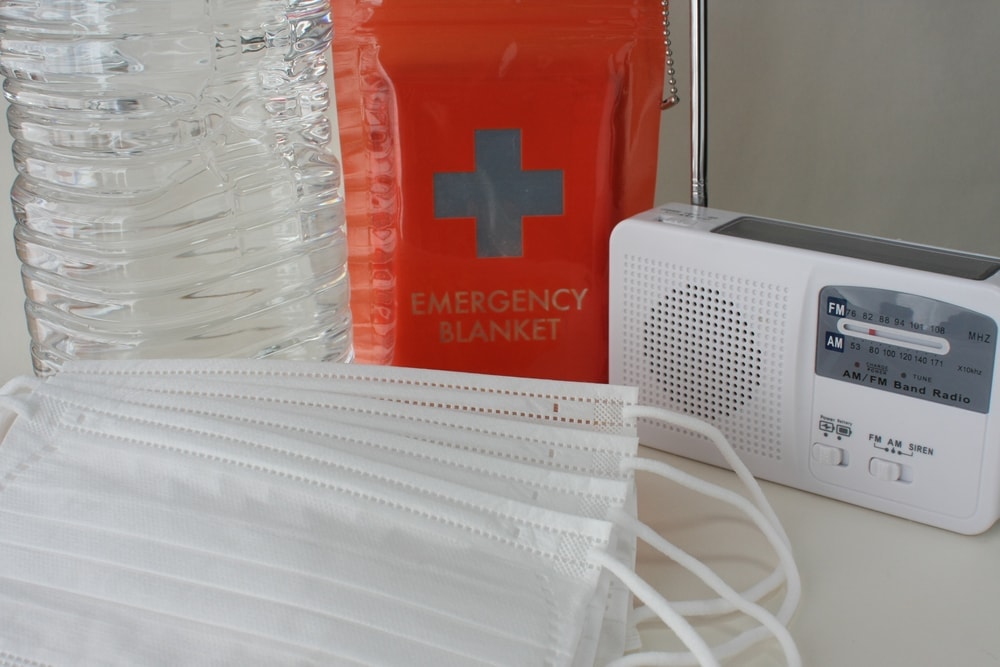Emergency kit and a weather radio for camping