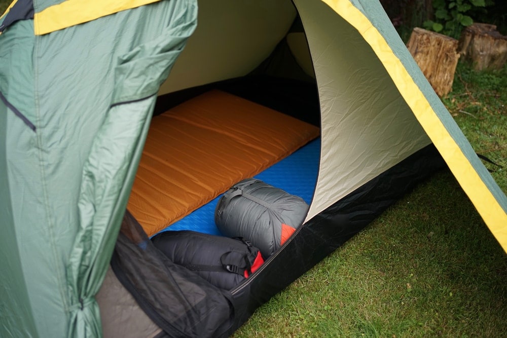 Close up look of a camping tent with sleeping pad