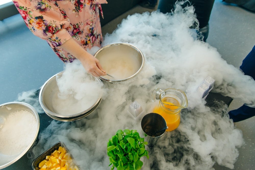 Lady cooking using dry ice 