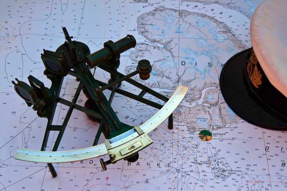 sextant placed on a map