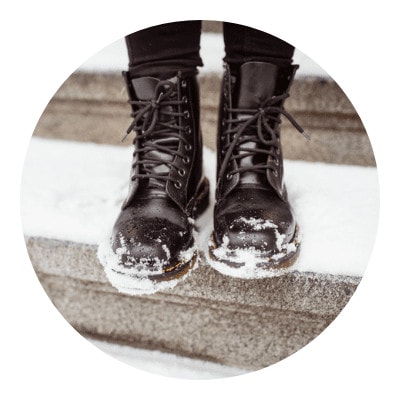 Hiking boots covered in snow