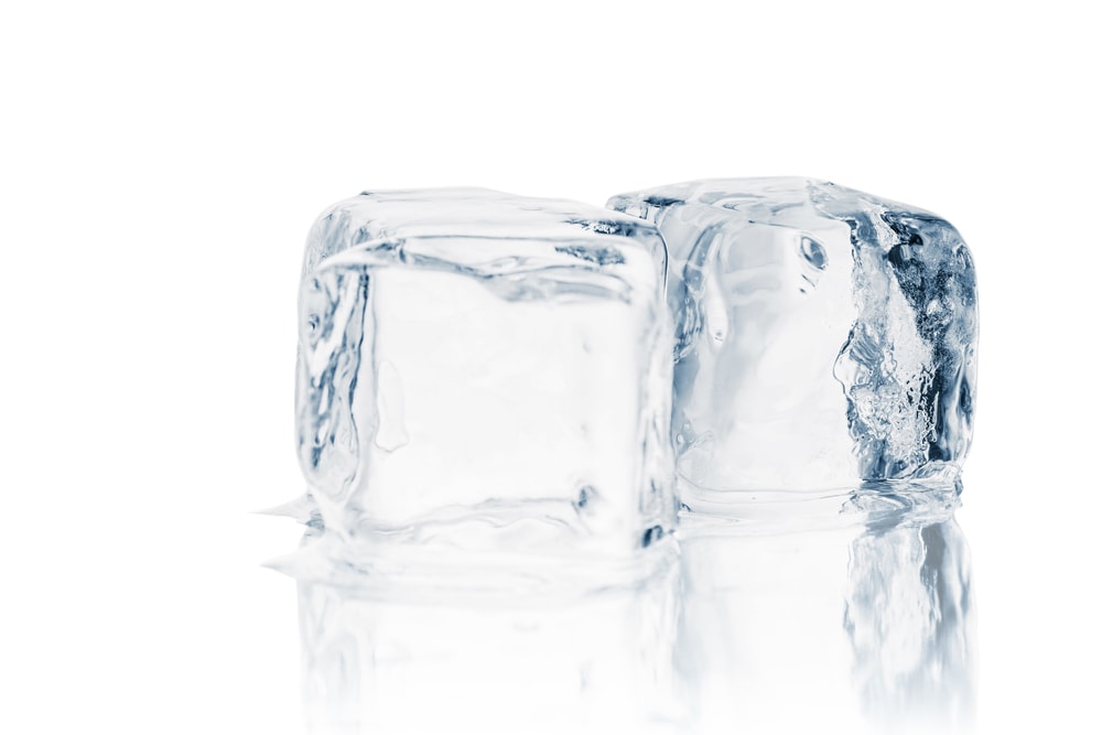 Block of ice on white background