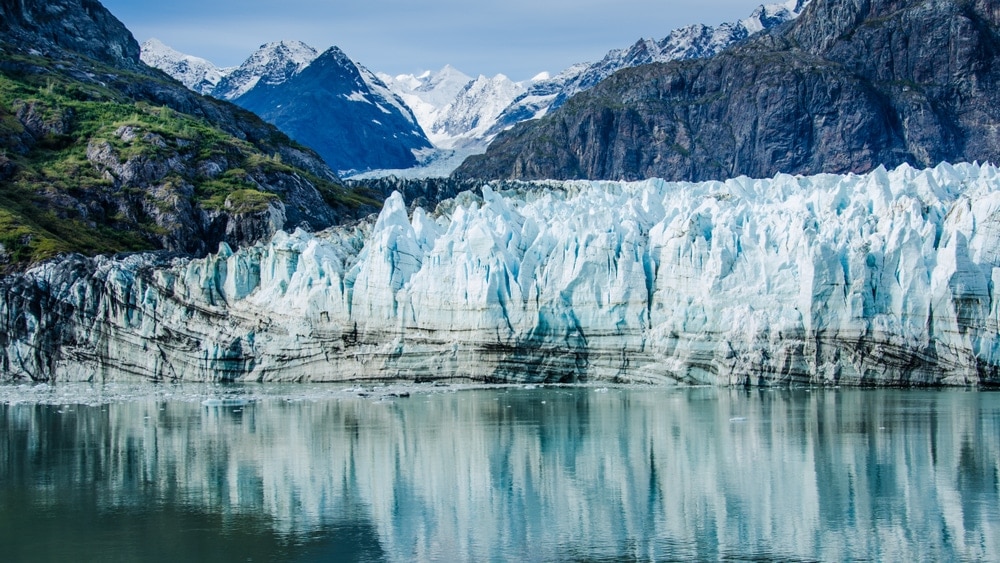 Margerie Glacier in Glacier Bay National Park and Preserve in Southeast Alaska and mountainous view at the backgorund