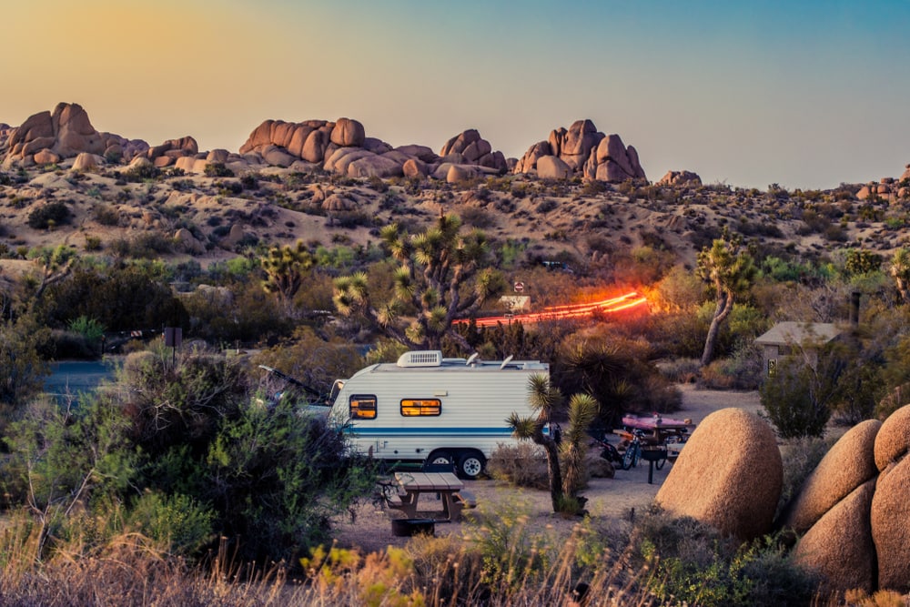 RV at a campground in Joshua Tree during sunset