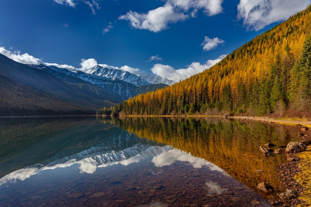 Great Northern Mountain reflection on  Stanton Lake in autumn in the Flathead National Forest
