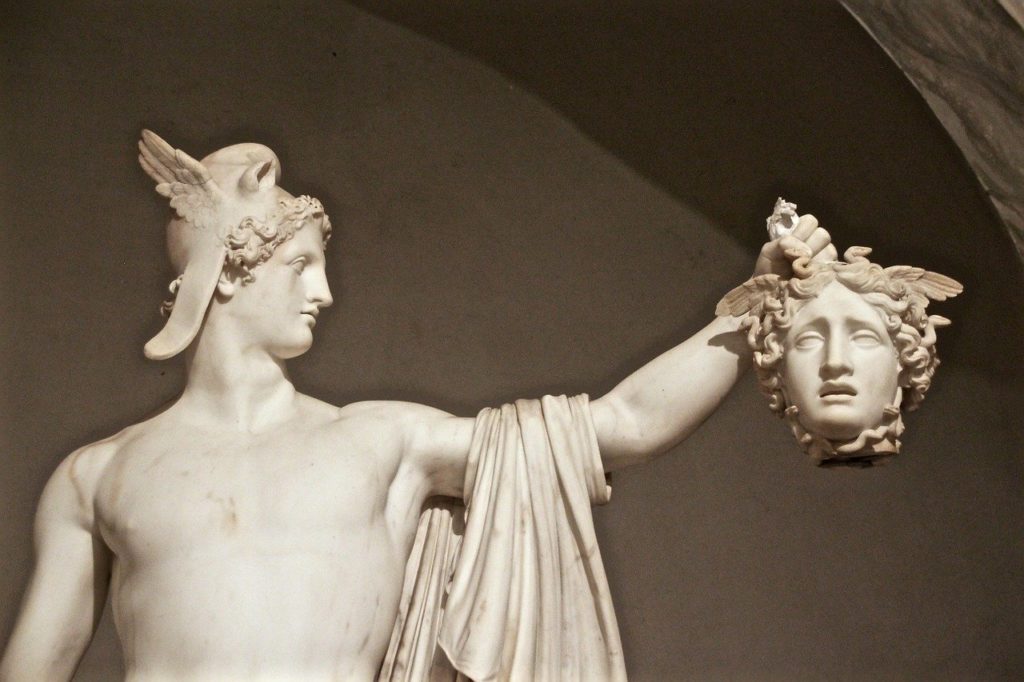 Statue of Medusa's head being cut off