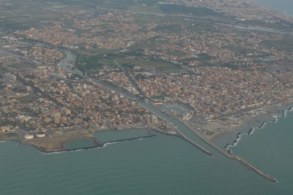 Aerial view of Fiumicino town, Tiber river delta and the Tyrrhenian Sea, Italy