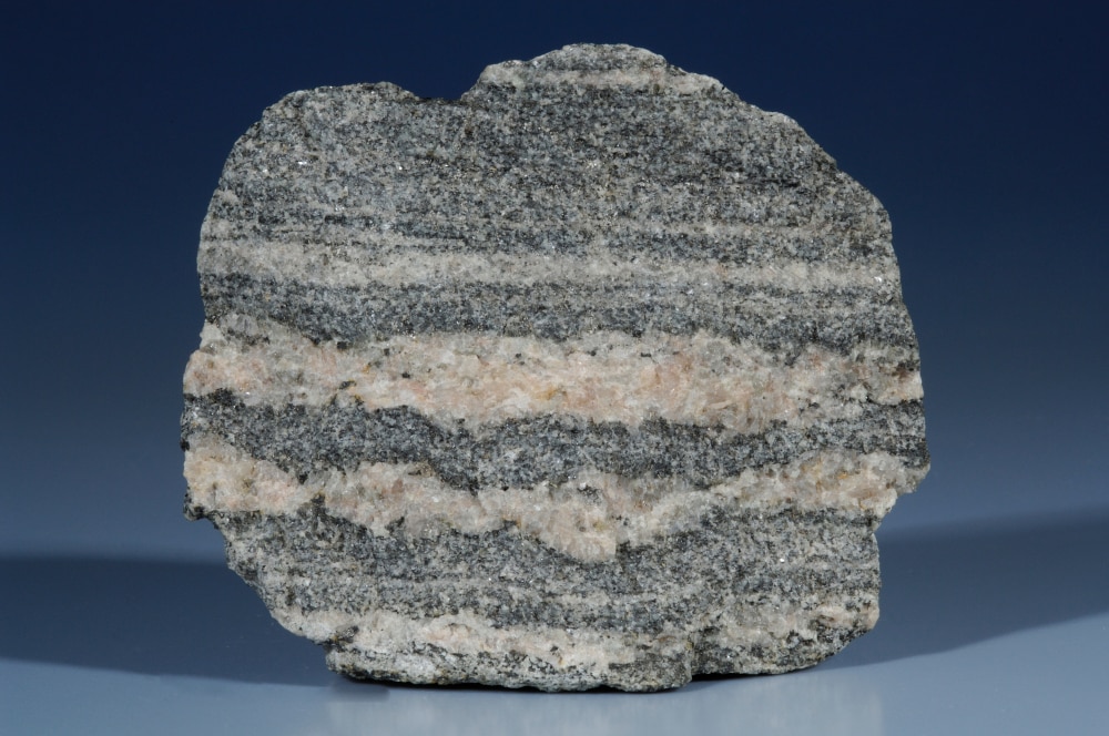 Gneiss, Metamorphic Rocks example, on blue background