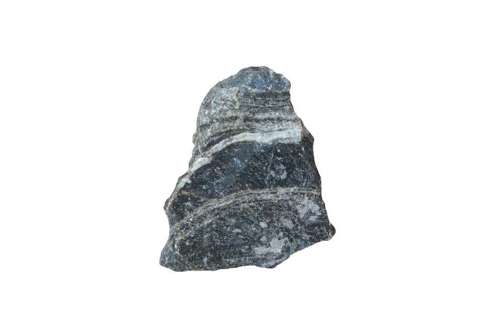 Gneiss rock on white background