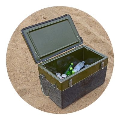 Metal cooler with bottle of water and coke inside
