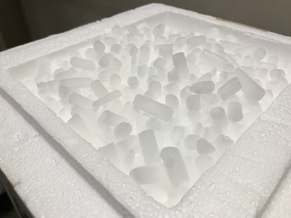 Cubes of dry ice piled on a box