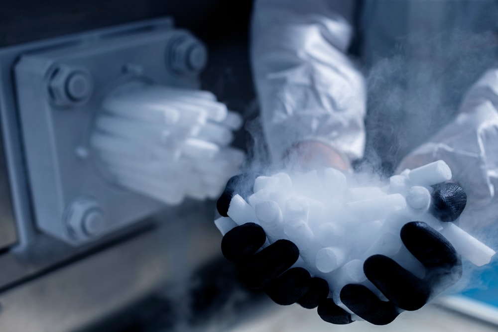 Dry ice holding by a man on the production