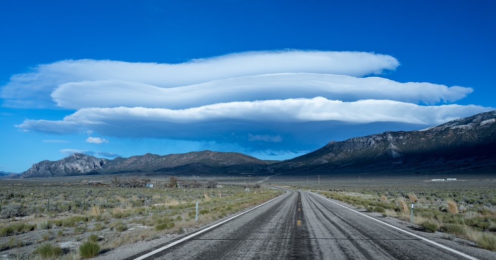 Lenticular clouds in the middle of mountain