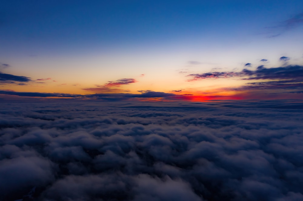 Silhouette of sunset above the clouds