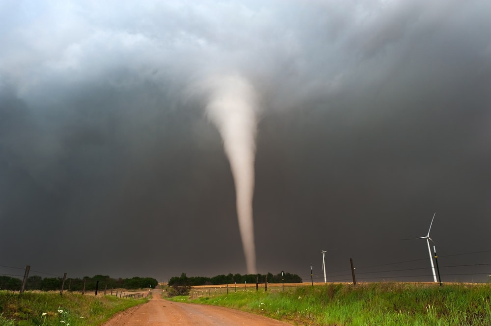 photo of a tornado hitting up a plain