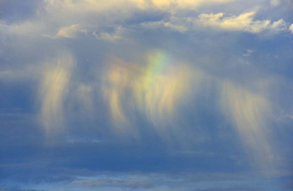 Virga forming a rainbow