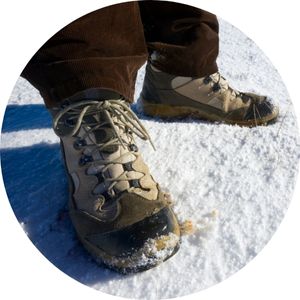 winter boots on a snow