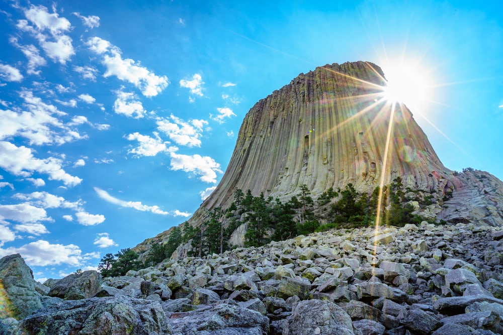 Devil tower formed by igneous rocks blocking the sun