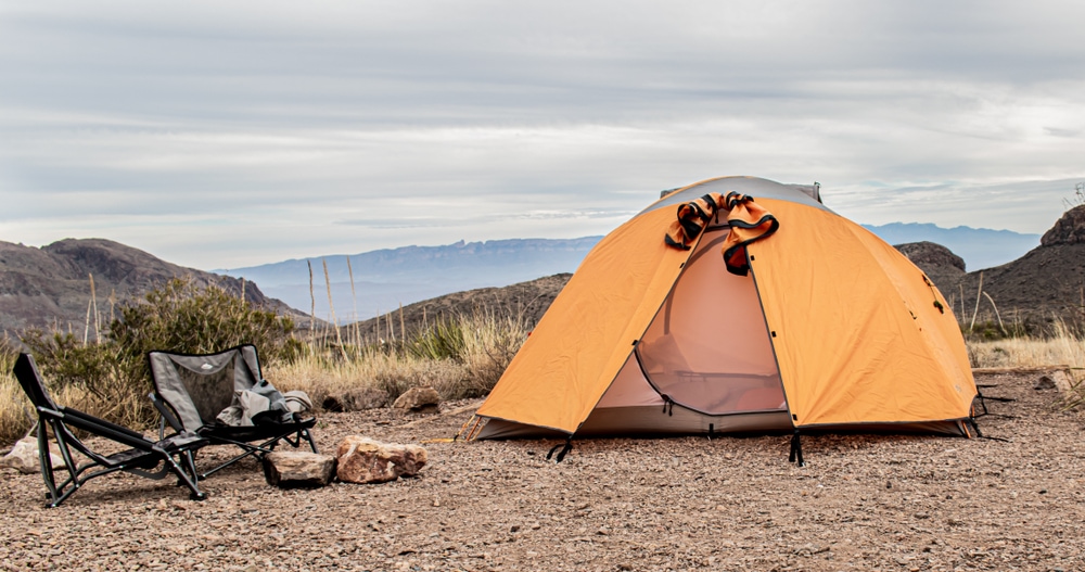 Primitive camping with an orange tent in Big Bend