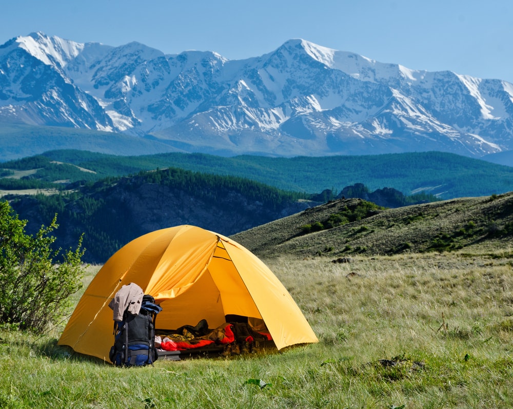 image of a tent in the mountains