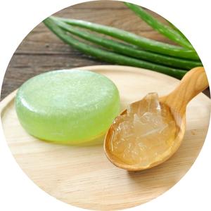aloe vera soap on a wooden plate