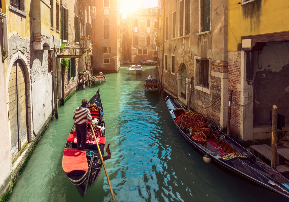 Boat riding on the waters of Venice canal