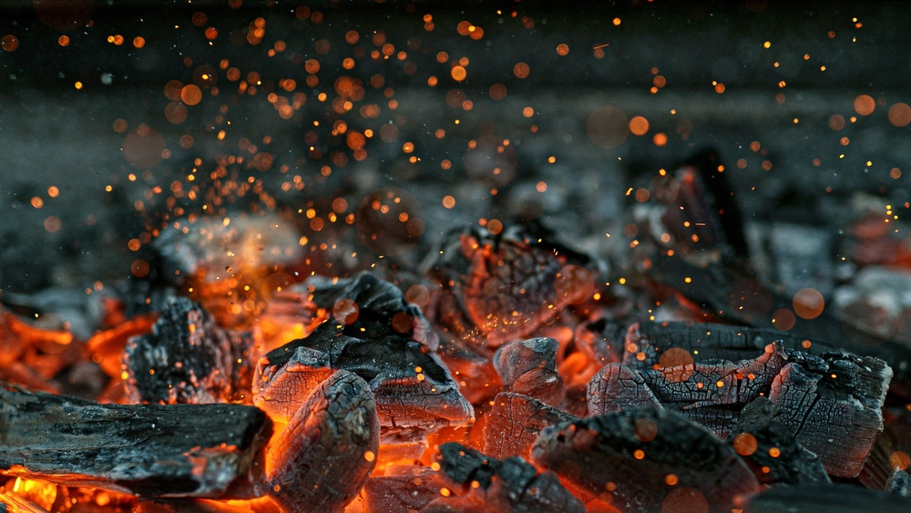 Close up photo of charcoal the its flames