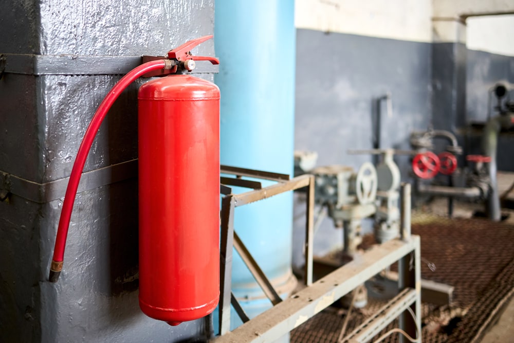 Fire extinguisher hanged on a wall