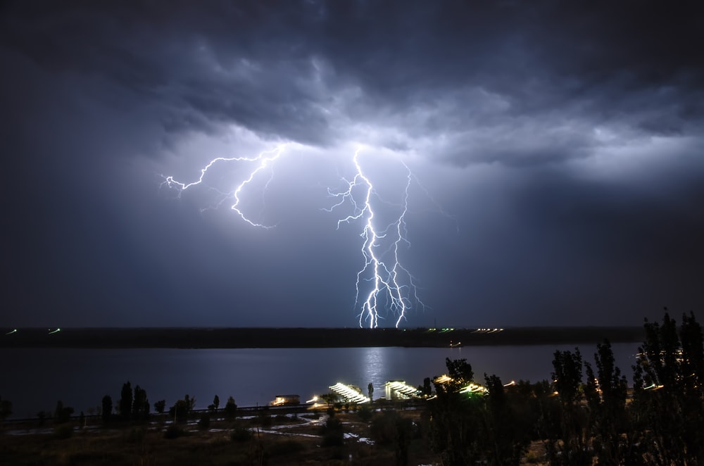 a lightning strike over a river