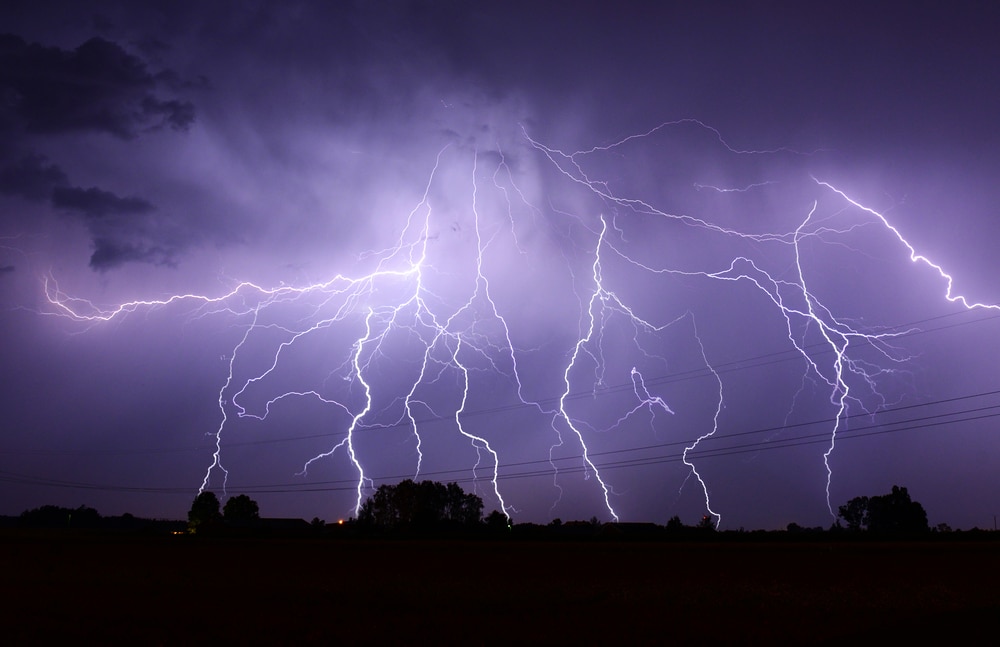 image of a thunderstorm with lightning during night time