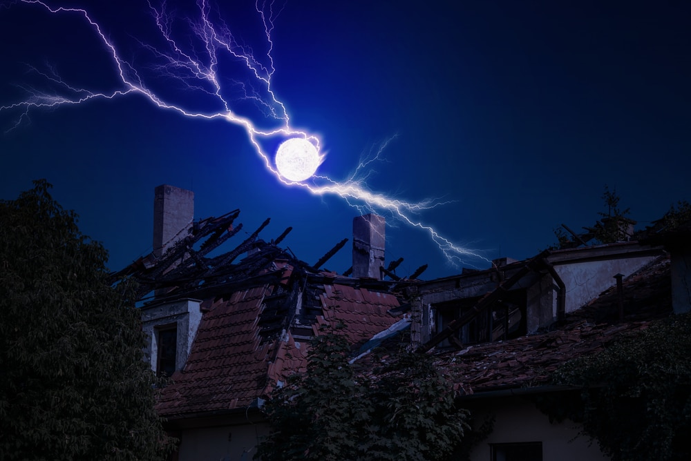 image of a ball of lightning and a broken house 