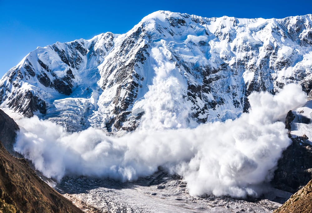 image of a powerful avalanche  in Caucasus, Kabardino-Balkaria, Bezengi region, Russia