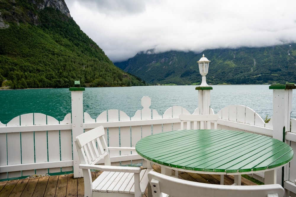 Bench beside a green fjord