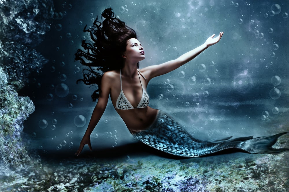 Mermaid filled with bubbles surrounding her