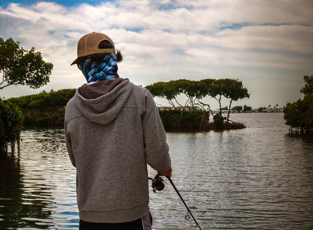 Man inshore fishing at the lake