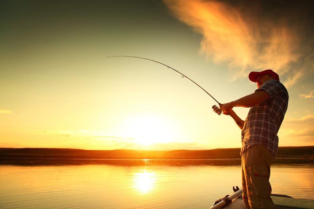 Man pulling up its rod on fishing