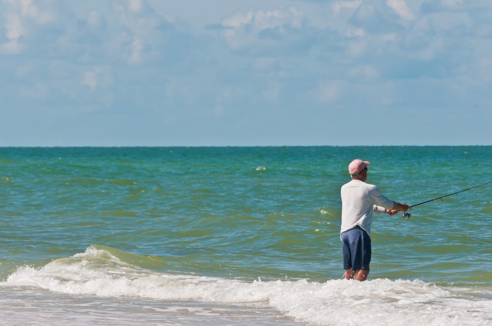 Man fishing on the ocean