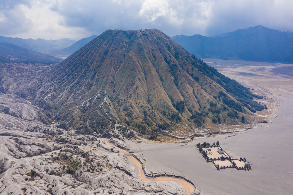 Aerial view of the volcanic cinder cone Mount Batok  in Java, Indonesia