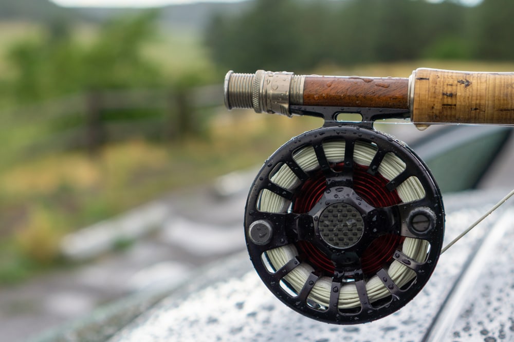 Close up photo of a fly fishing rod reel