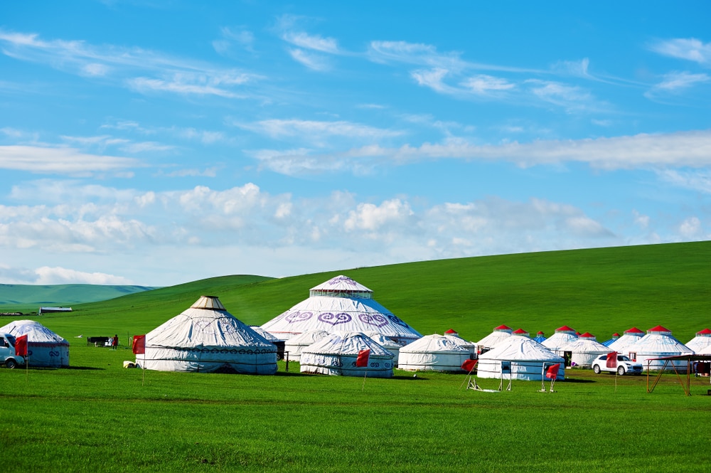 Mongolian yurts in a field in Hulunbuir, Mongolia