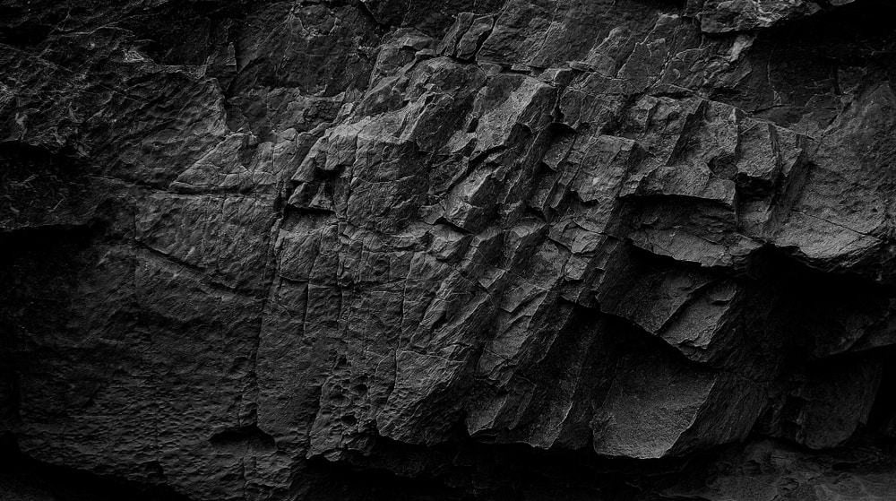 Photo of a rock during midnight