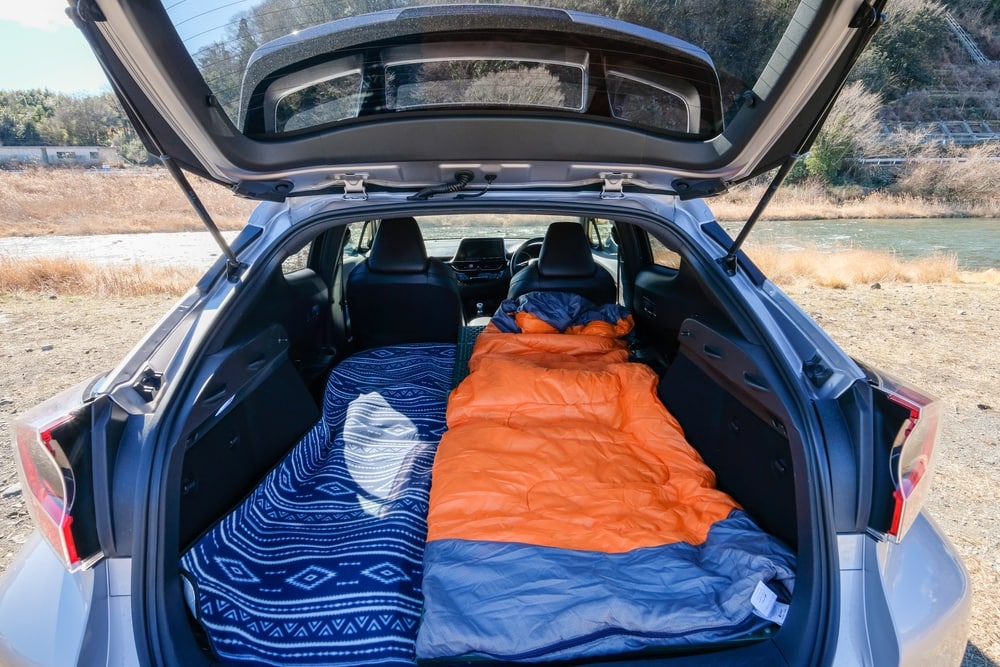 sleeping bags inside a car