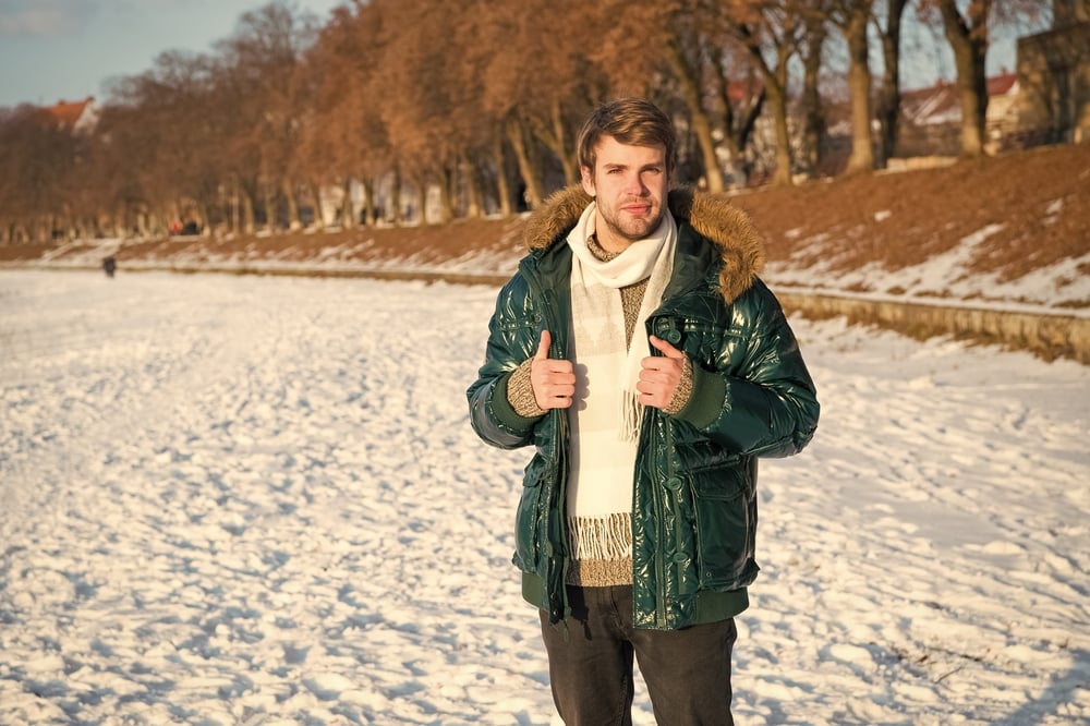 A man wearing layered clothes during winter