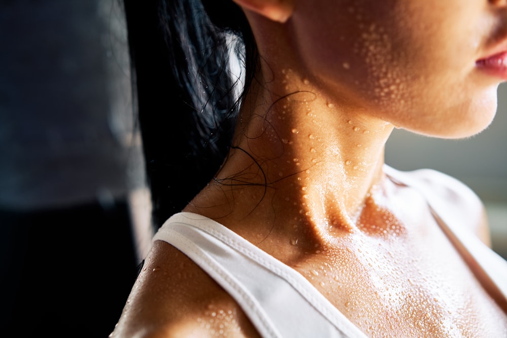 Close of a sweat from neck and shoulders 