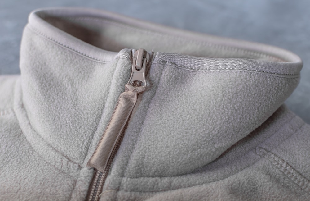 Close up of a gray jacket made of fleece